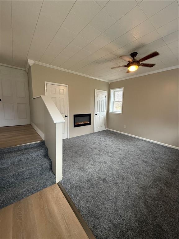 4450 Morefield Road Hermitage, PA 16148 - Photo 11 of 16 an empty room with windows and fireplace