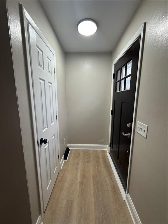 4450 Morefield Road Hermitage, PA 16148 - Photo 5 of 16 wooden floor in a hall with wooden floor and a mirror