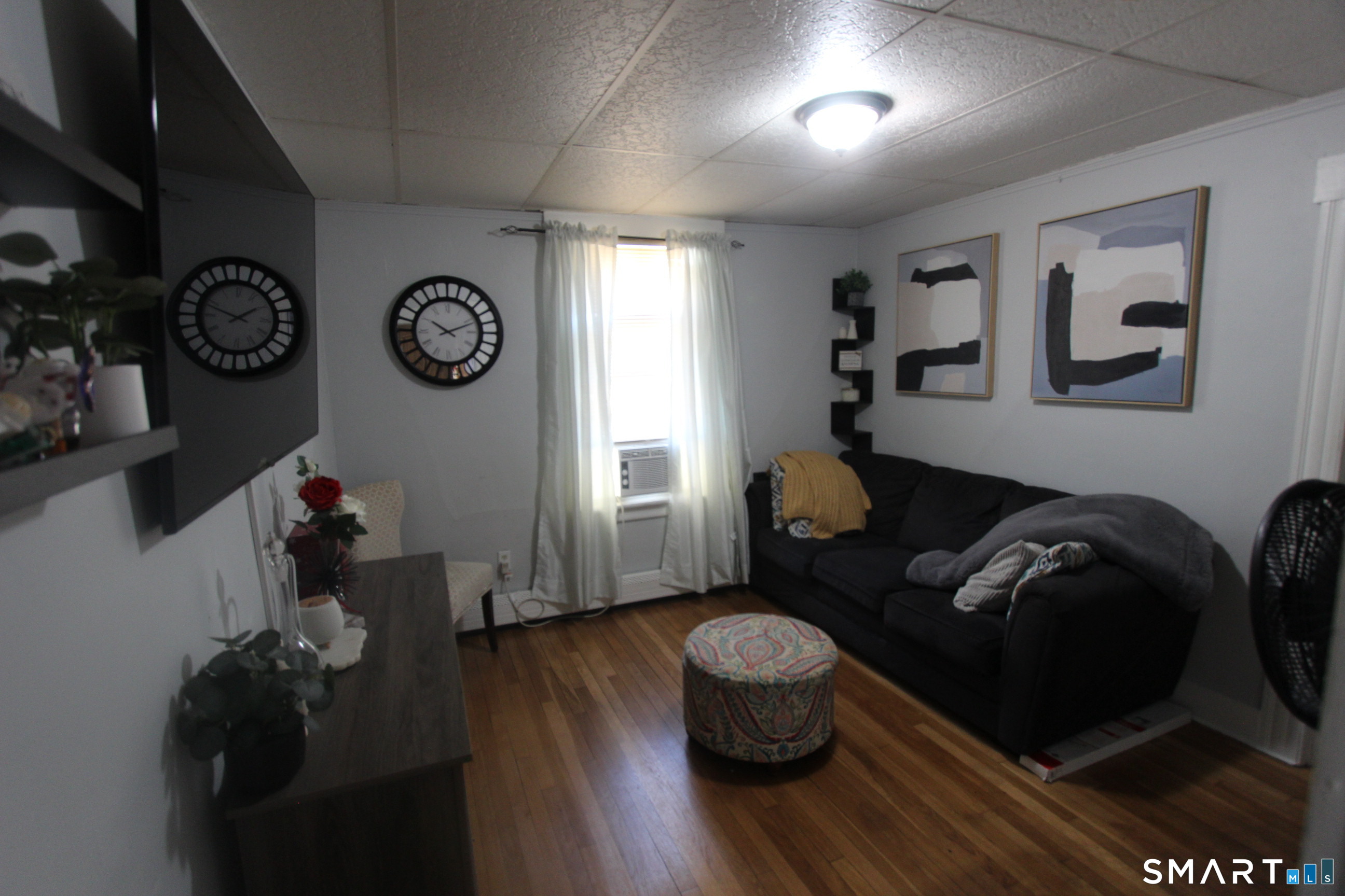 23 North Spring Street Ansonia, CT 06401 - Photo 7 of 7 a living room with furniture and wooden floor