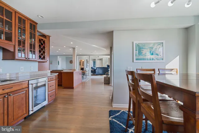 a kitchen that has a sink and a stove in it