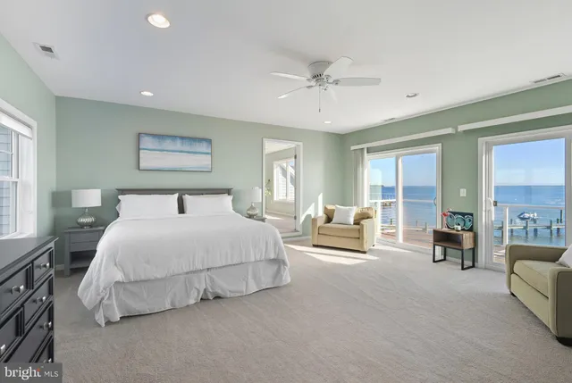 a view of a balcony with two chairs