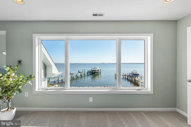 a bathroom with a sink and a large mirror