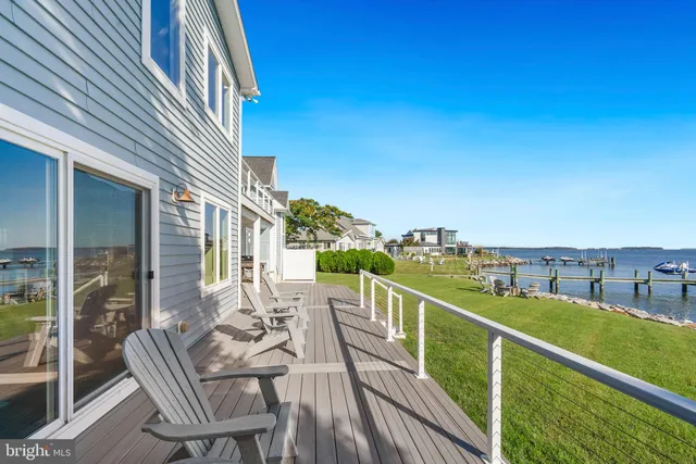 a view of a balcony with furniture