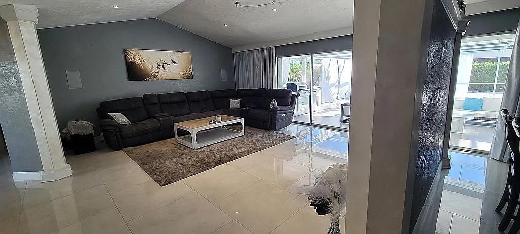 1840 Flametree Lane Venice, FL 34293 - Photo 6 of 26 a living room with furniture and a window