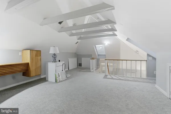 a view of a hallway with staircase