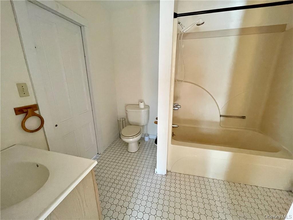 17 Ribbecke Hill Road, Unit 1 Pine Bush, NY 12566 - Photo 9 of 13 a bathroom with a sink and a shower