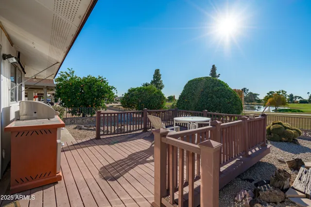 a view of a roof deck with couches