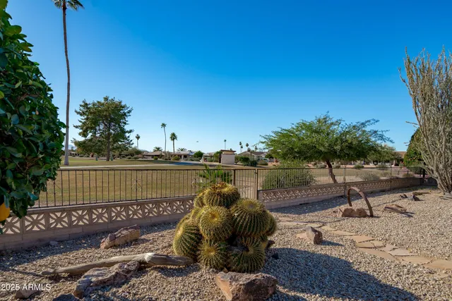 a view of a lake with a sitting area