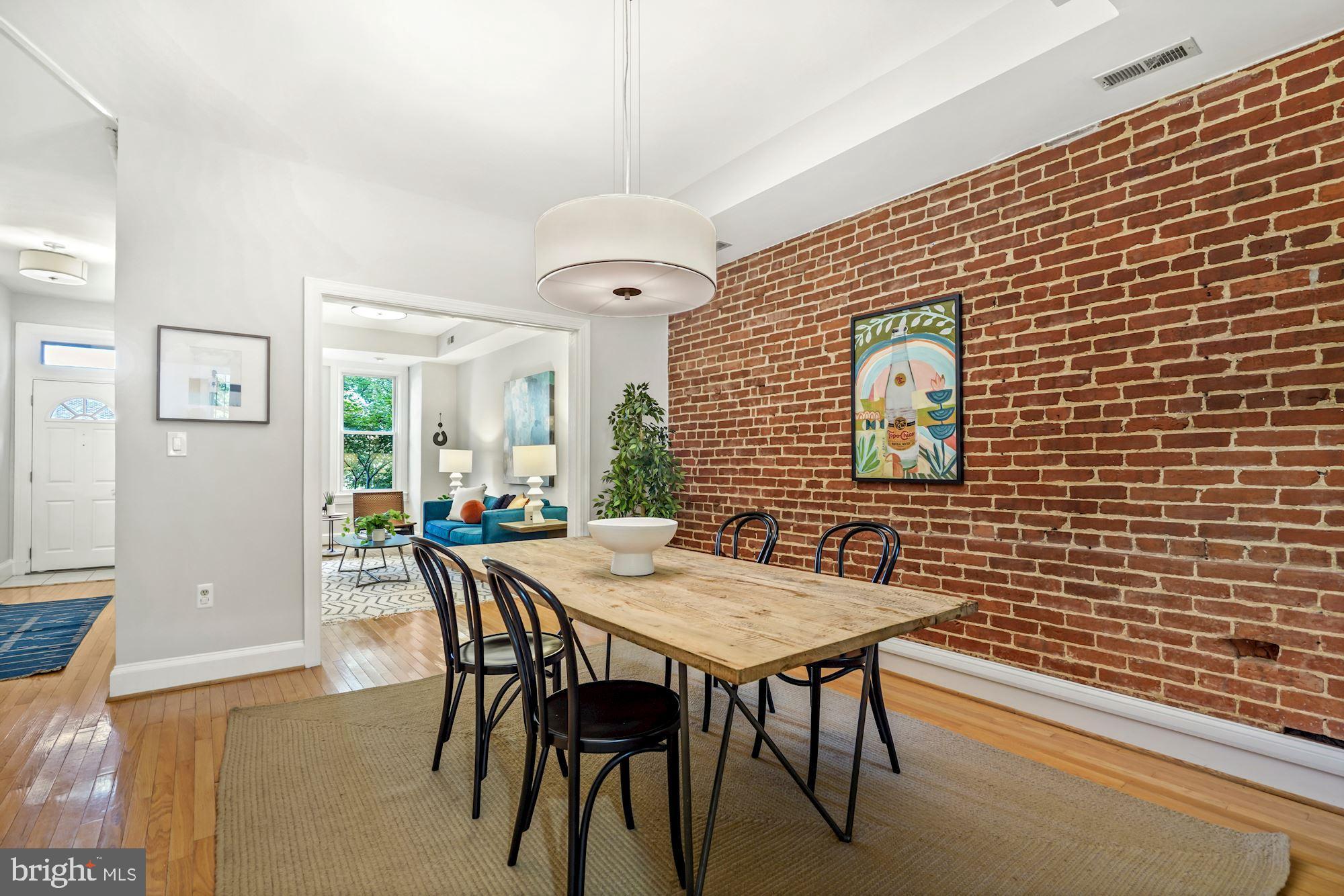 525 5th Street Northeast Washington, DC 20002 - Photo 6 of 22 Exposed brick, hardwoods and designer lighting
