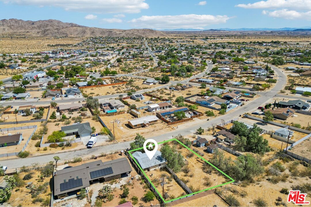 61855 Valley View Circle Joshua Tree, CA 92252 - Photo 43 of 59 an aerial view of residential building with parking space