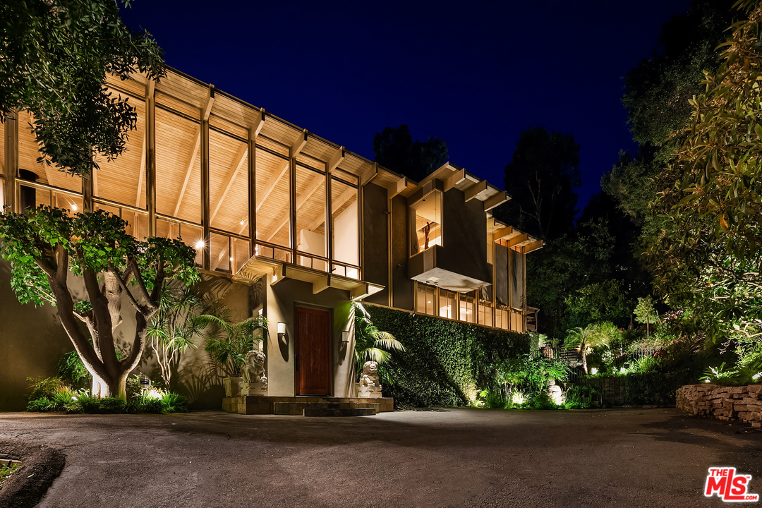 7330 Pyramid Drive Los Angeles, CA 90068 - Photo 1 of 37 a view of a street with a building in the background