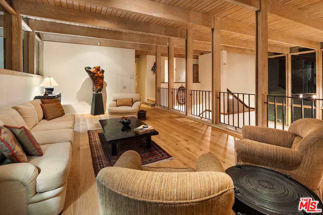 7330 Pyramid Drive Los Angeles, CA 90068 - Photo 16 of 37 a living room with furniture and a large window