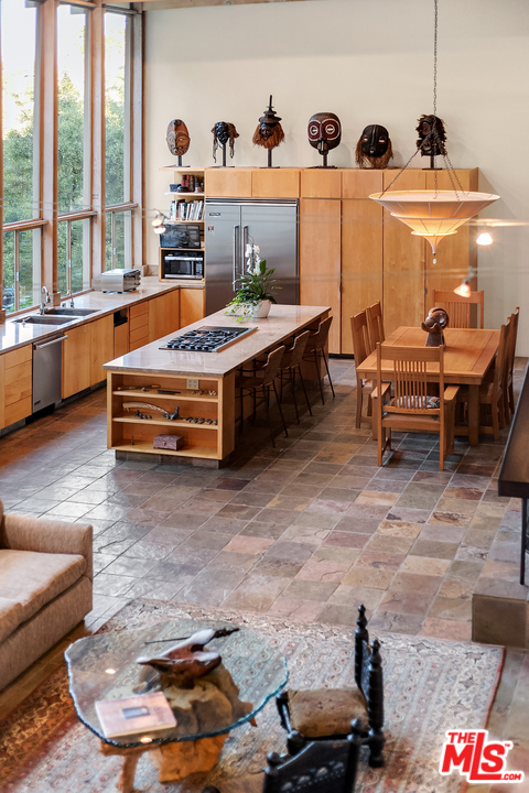 7330 Pyramid Drive Los Angeles, CA 90068 - Photo 4 of 37 a room with furniture and a large window