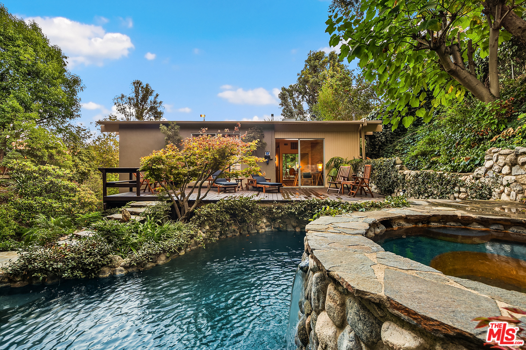7330 Pyramid Drive Los Angeles, CA 90068 - Photo 31 of 37 a front view of a house with garden