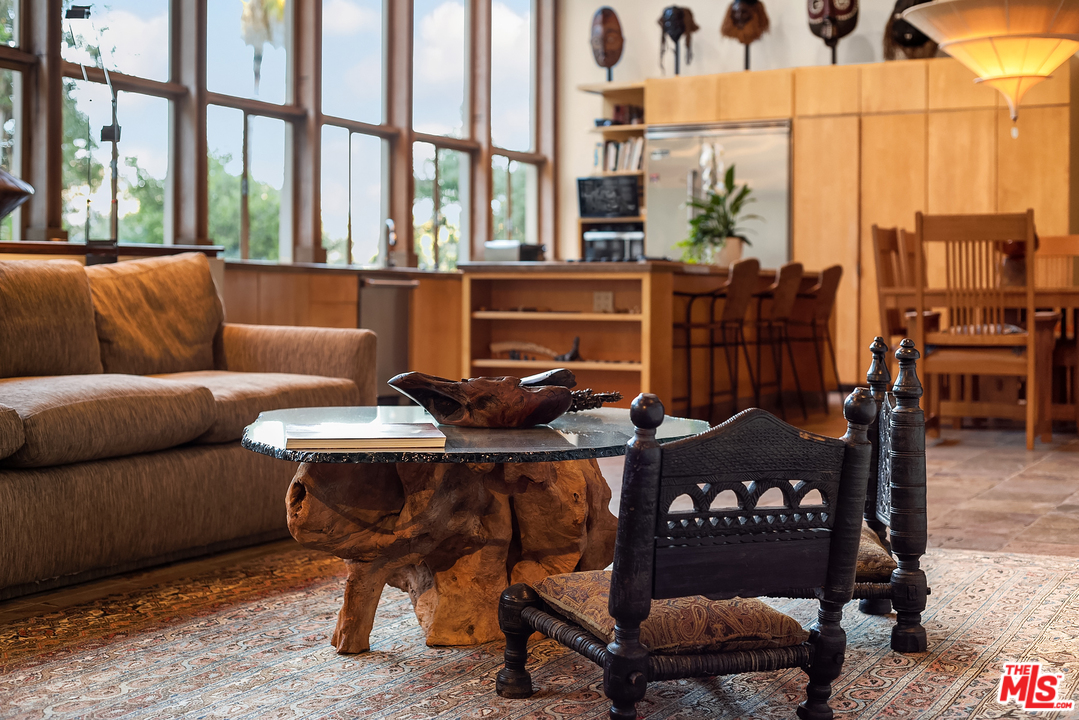 7330 Pyramid Drive Los Angeles, CA 90068 - Photo 5 of 37 a living room with furniture a city view and large windows