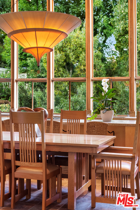 7330 Pyramid Drive Los Angeles, CA 90068 - Photo 8 of 37 a view of a patio with a table and chairs