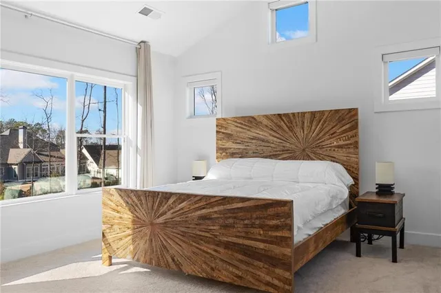 a white bath tub sitting next to a window