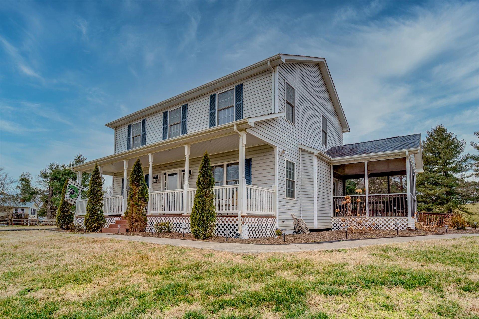 1183 Carroll Road Goodview, VA 24095 - Photo 1 of 61 front view of a house with a yard