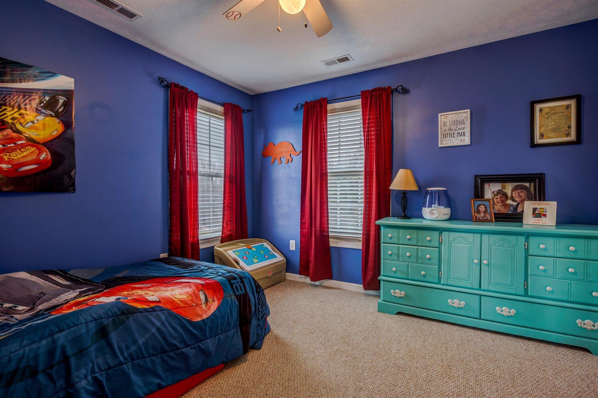 1183 Carroll Road Goodview, VA 24095 - Photo 35 of 61 a bedroom with a bed and a dresser