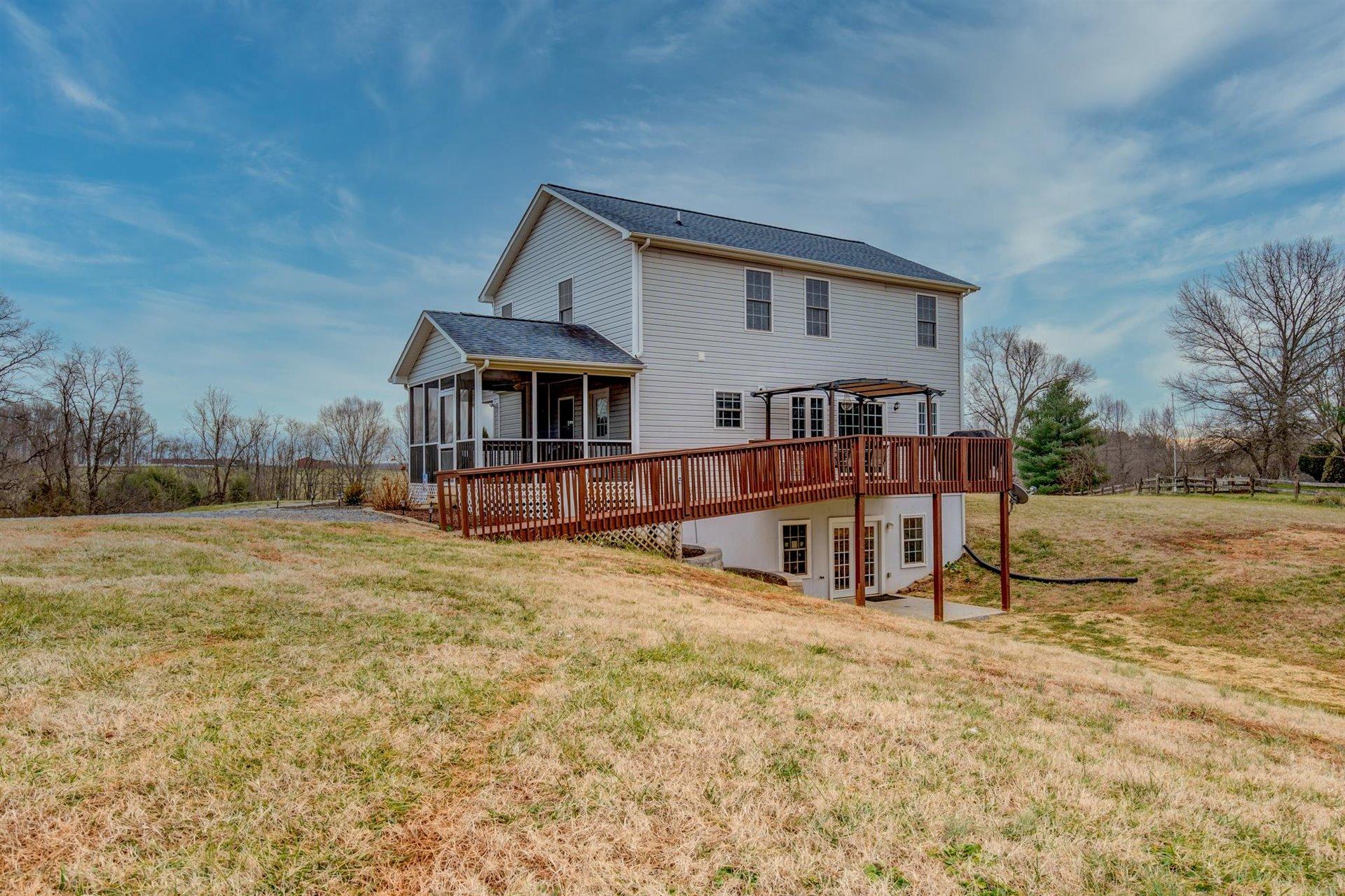 1183 Carroll Road Goodview, VA 24095 - Photo 48 of 61 front view of a house with a yard