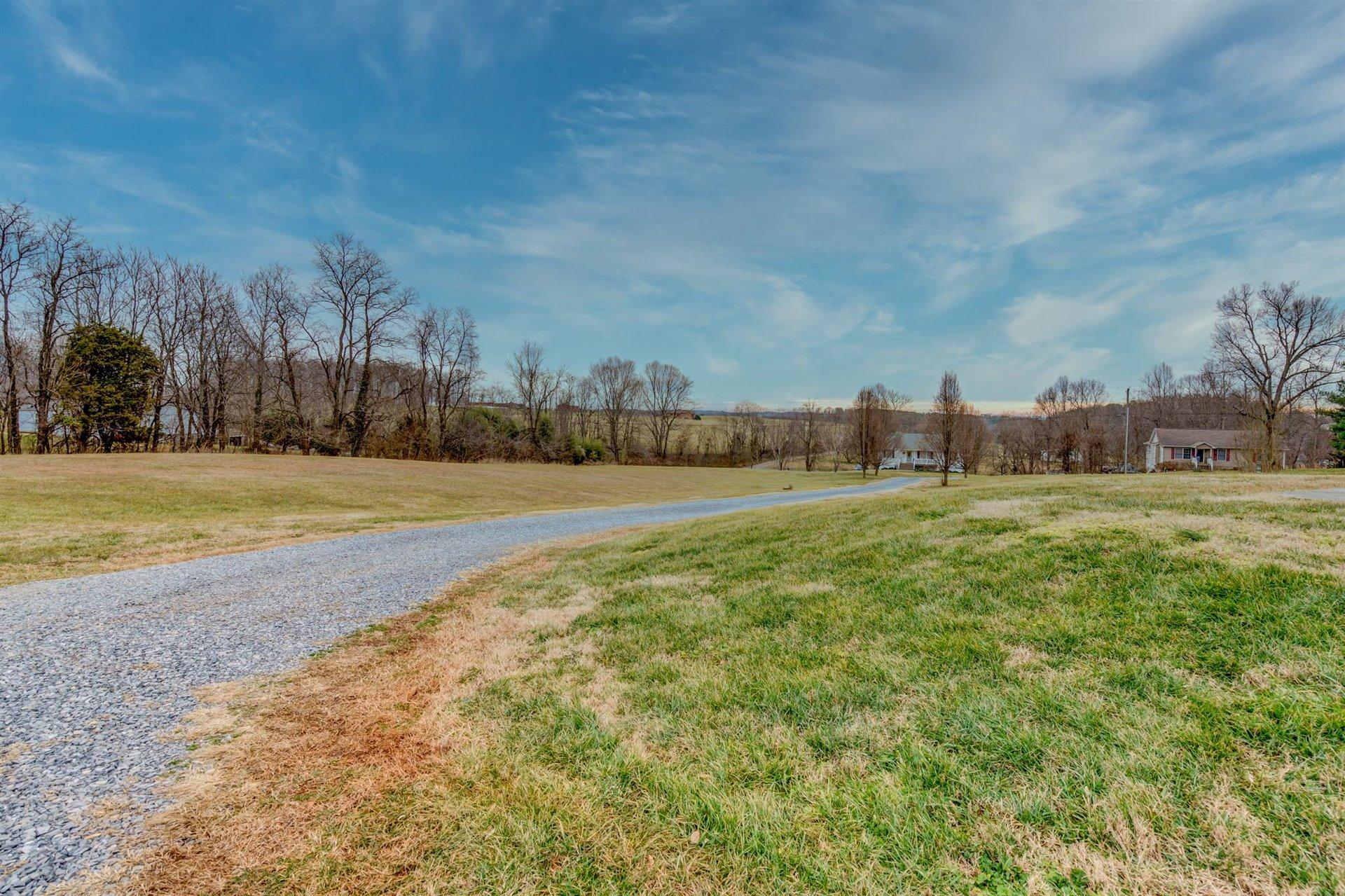 1183 Carroll Road Goodview, VA 24095 - Photo 55 of 61 a view of a field with trees in the background