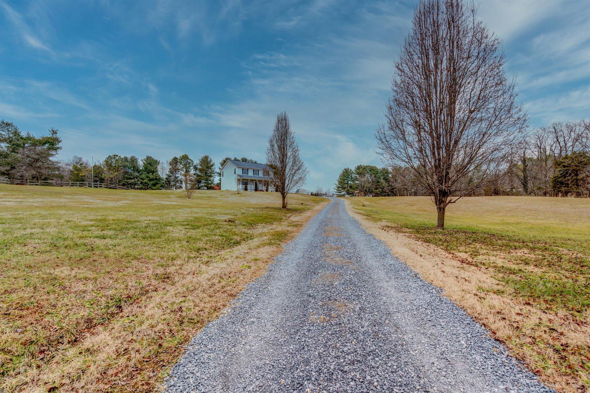 1183 Carroll Road Goodview, VA 24095 - Photo 56 of 61 a view of a yard with an ocean view