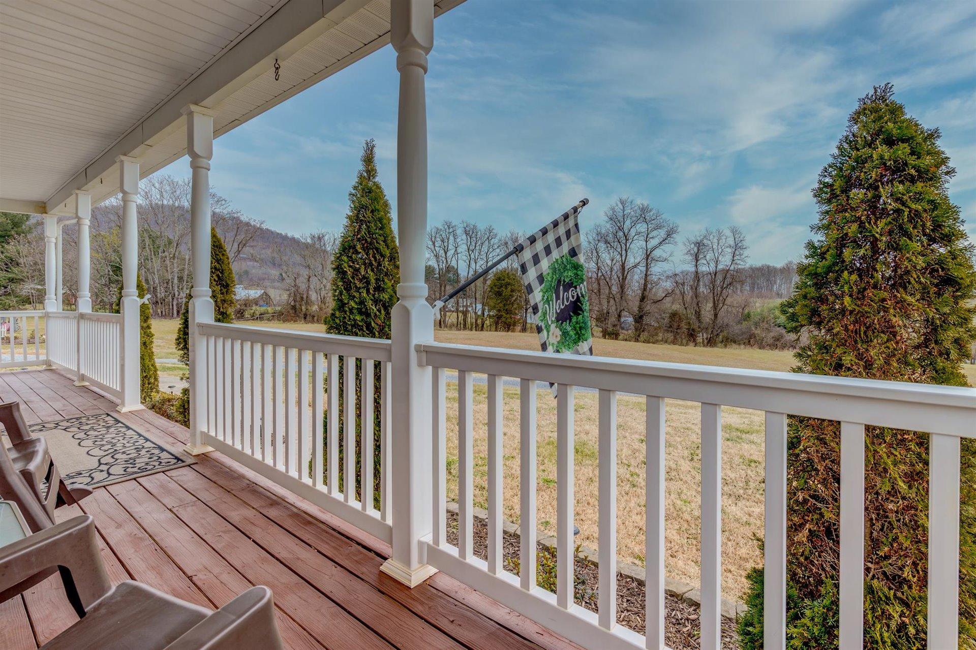 1183 Carroll Road Goodview, VA 24095 - Photo 7 of 61 a view of a balcony with wooden floor