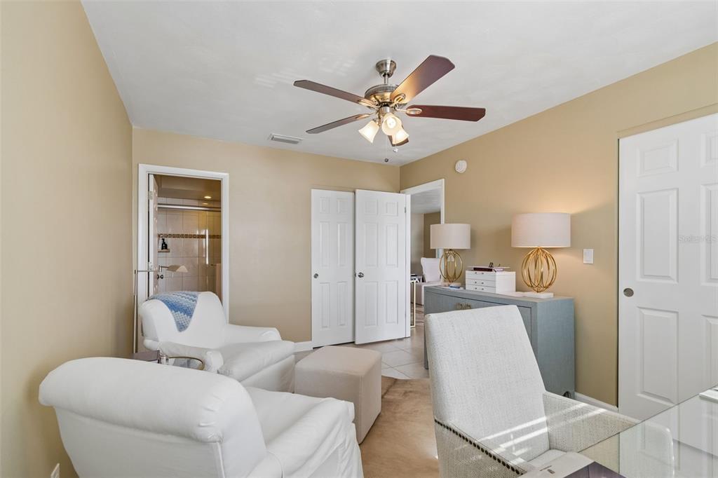 2307 Bay Boulevard Indian Rocks Beach, FL 33785 - Photo 13 of 85 a living room with furniture and a chandelier