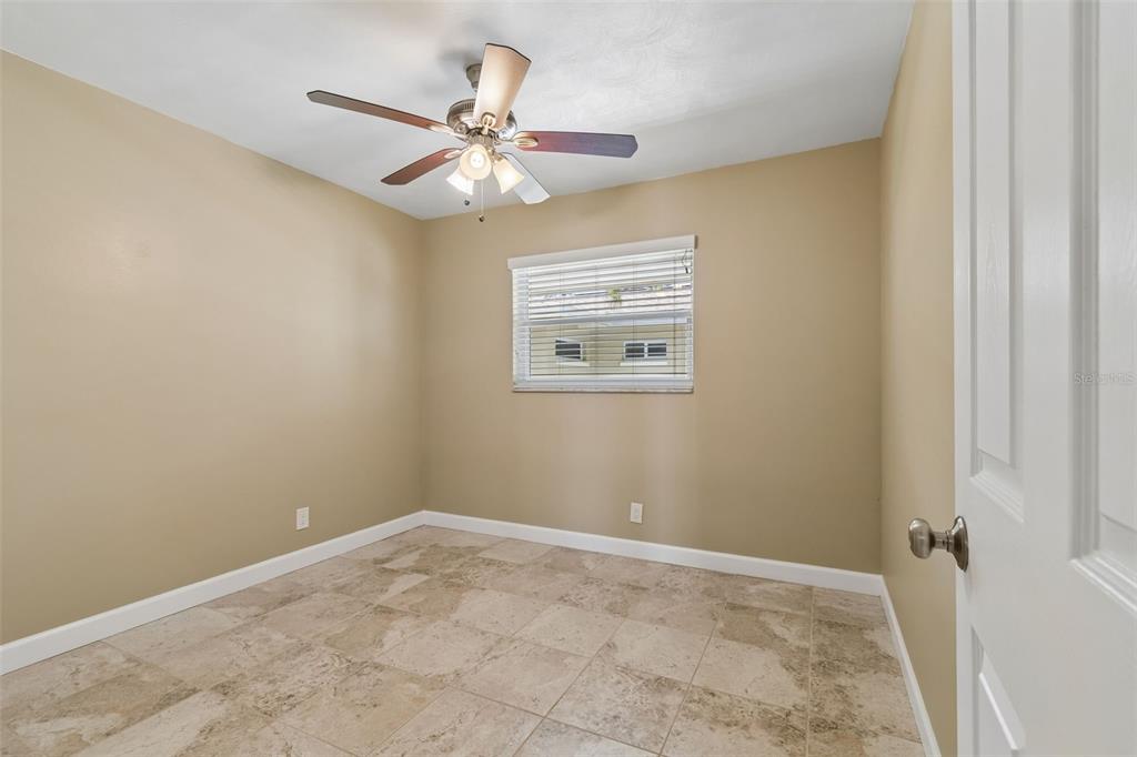 2307 Bay Boulevard Indian Rocks Beach, FL 33785 - Photo 55 of 85 a view of an empty room with a window