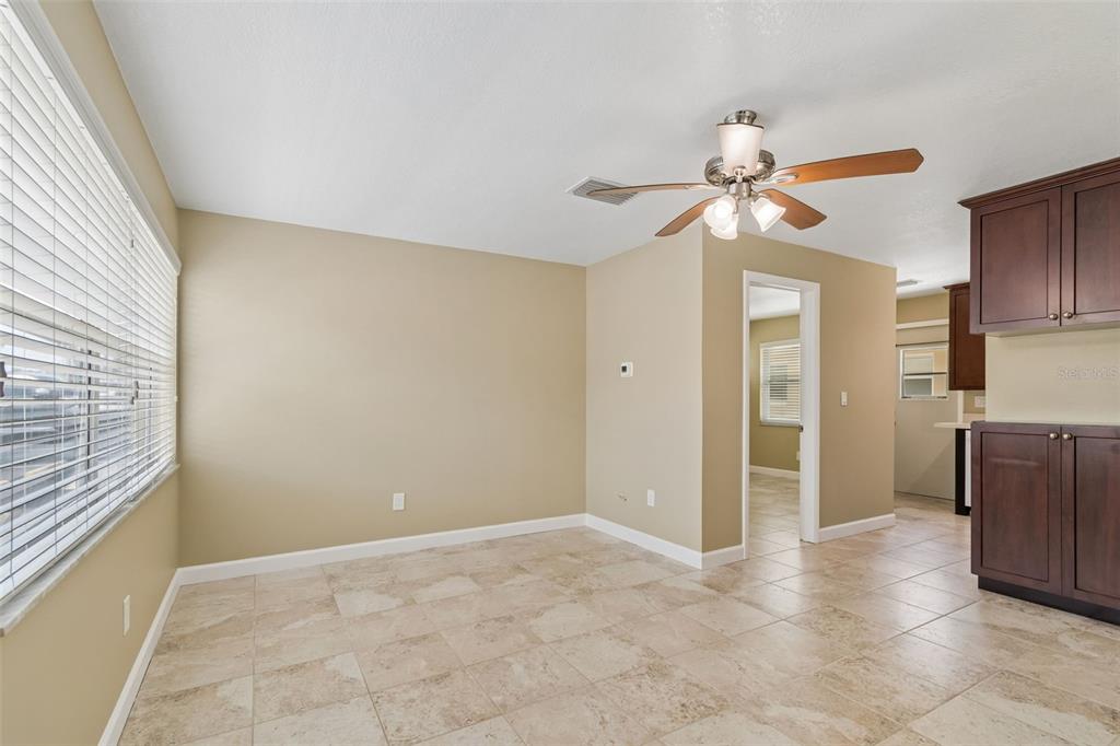 2307 Bay Boulevard Indian Rocks Beach, FL 33785 - Photo 76 of 85 a view of a kitchen with a sink and a cabinet fire place