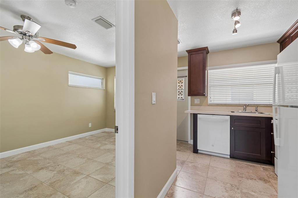 2307 Bay Boulevard Indian Rocks Beach, FL 33785 - Photo 79 of 85 a view of an empty room with a fireplace and a window