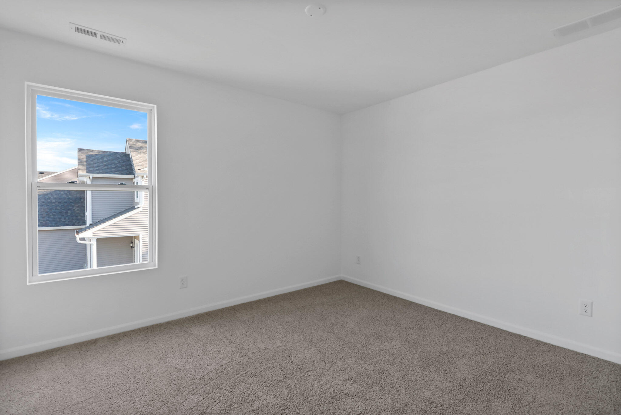3111 Buck Lane Portage, IN 46368 - Photo 17 of 24 a view of empty room with wooden floor and fan