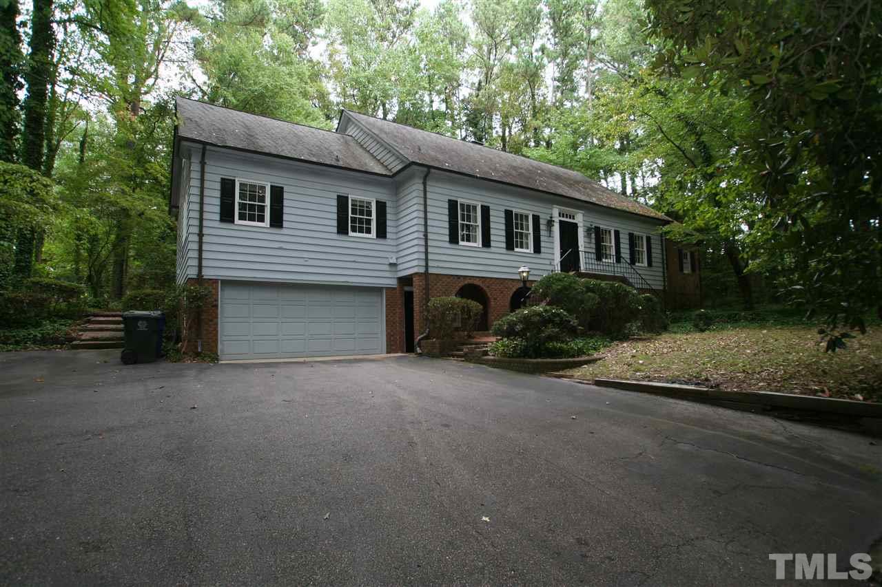 1304 Marlowe Road Raleigh, NC 27609 - Photo 1 of 21 a house with trees in the background