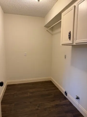 a view of small space with wooden floor