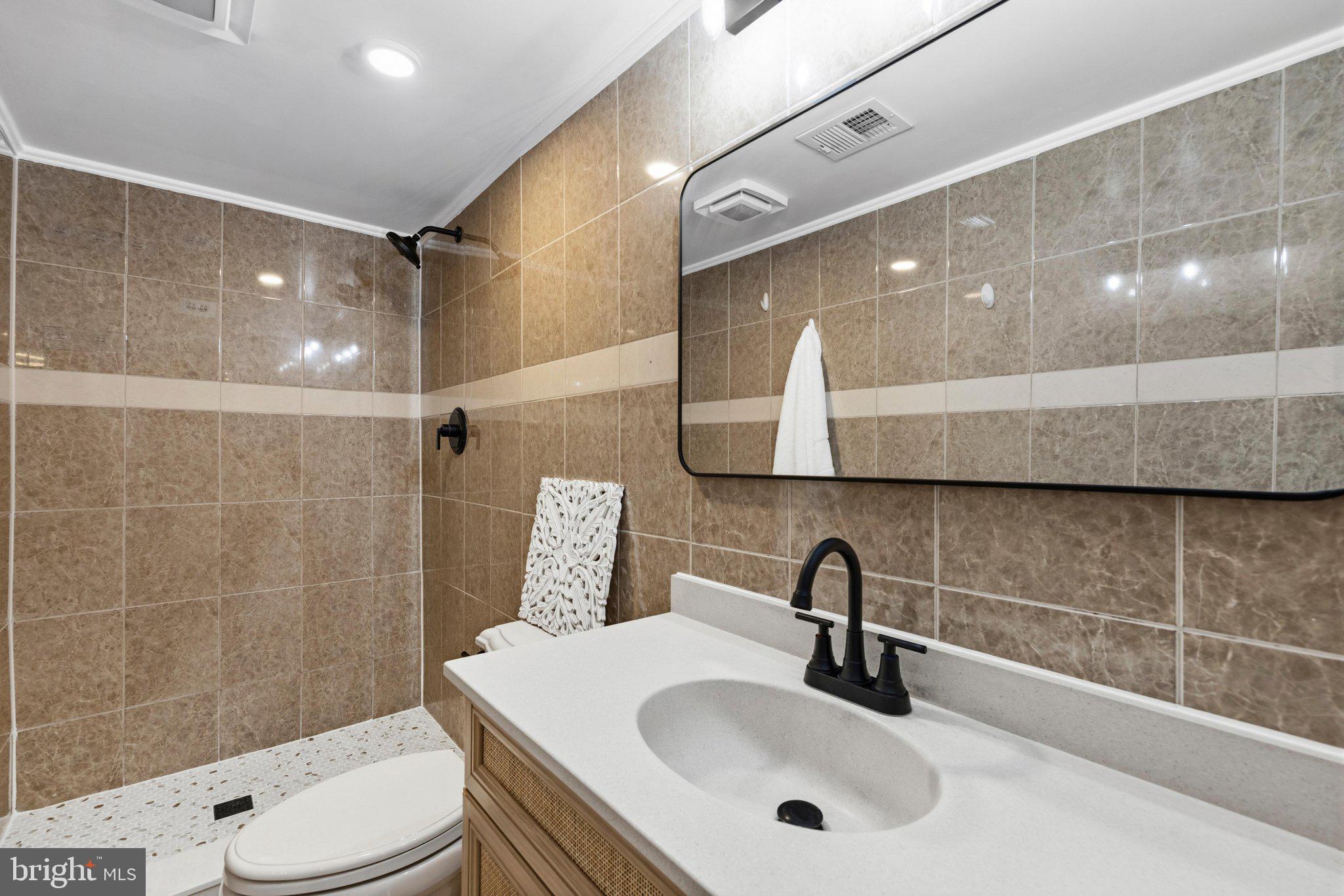 5804 Spell Road Clinton, MD 20735 - Photo 44 of 58 Lower level full bath
