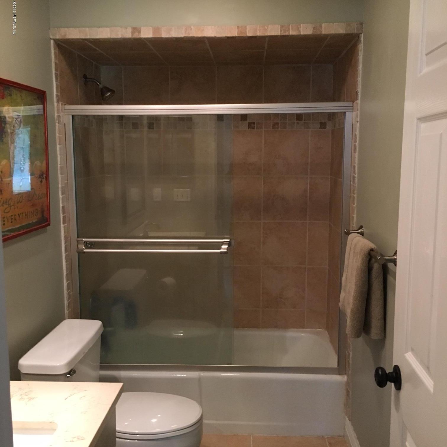 1441 Satsuma Road St. Johns, FL 32259 - Photo 11 of 45 a bathroom with a shower and a toilet