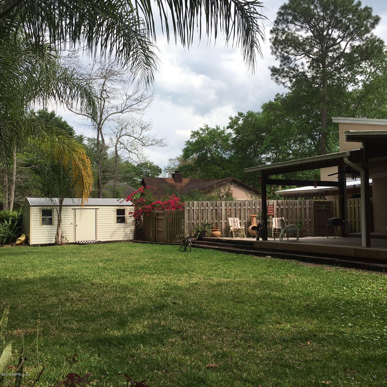 1441 Satsuma Road St. Johns, FL 32259 - Photo 13 of 45 a view of a house with a yard and sitting area