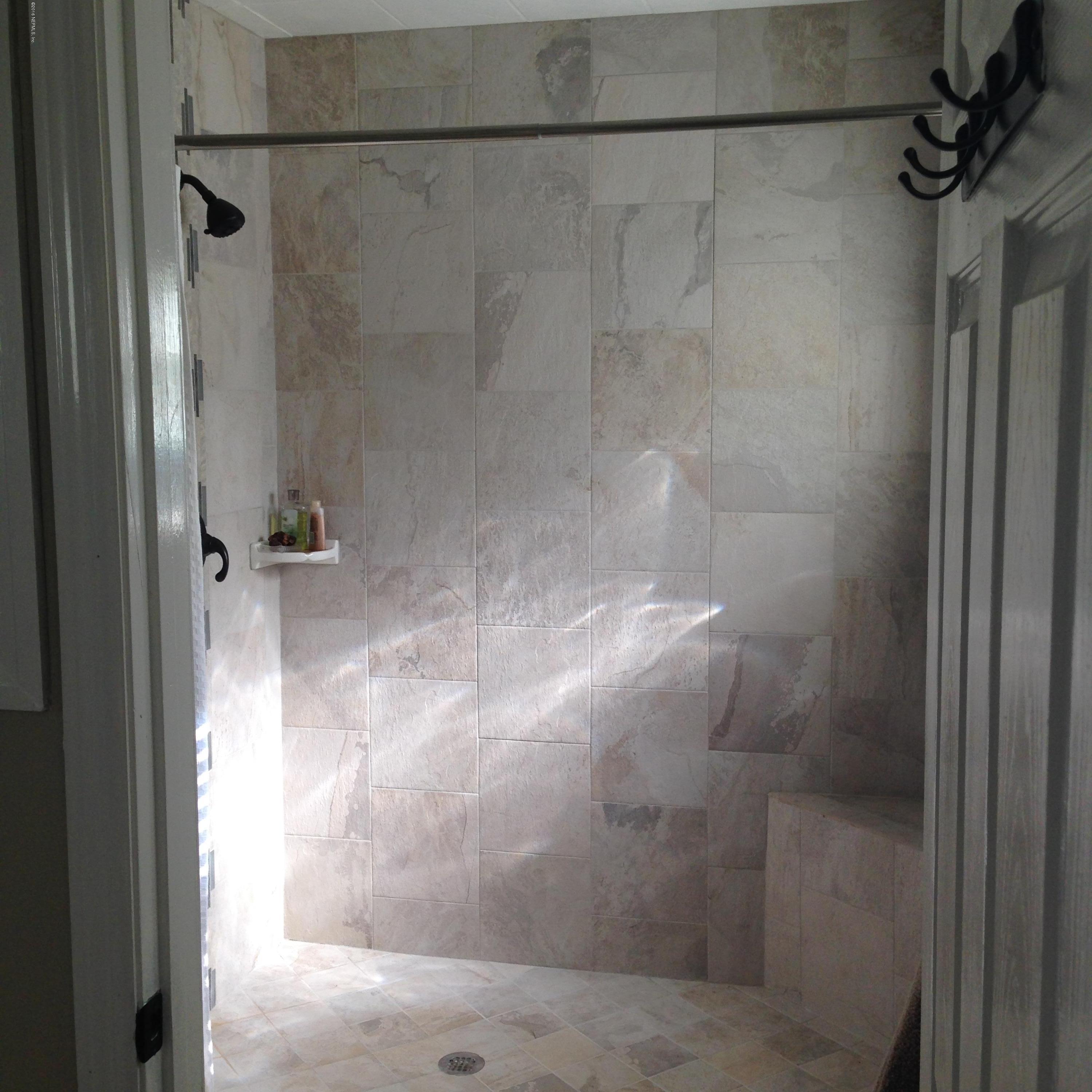 1441 Satsuma Road St. Johns, FL 32259 - Photo 20 of 45 a bathroom with a shower