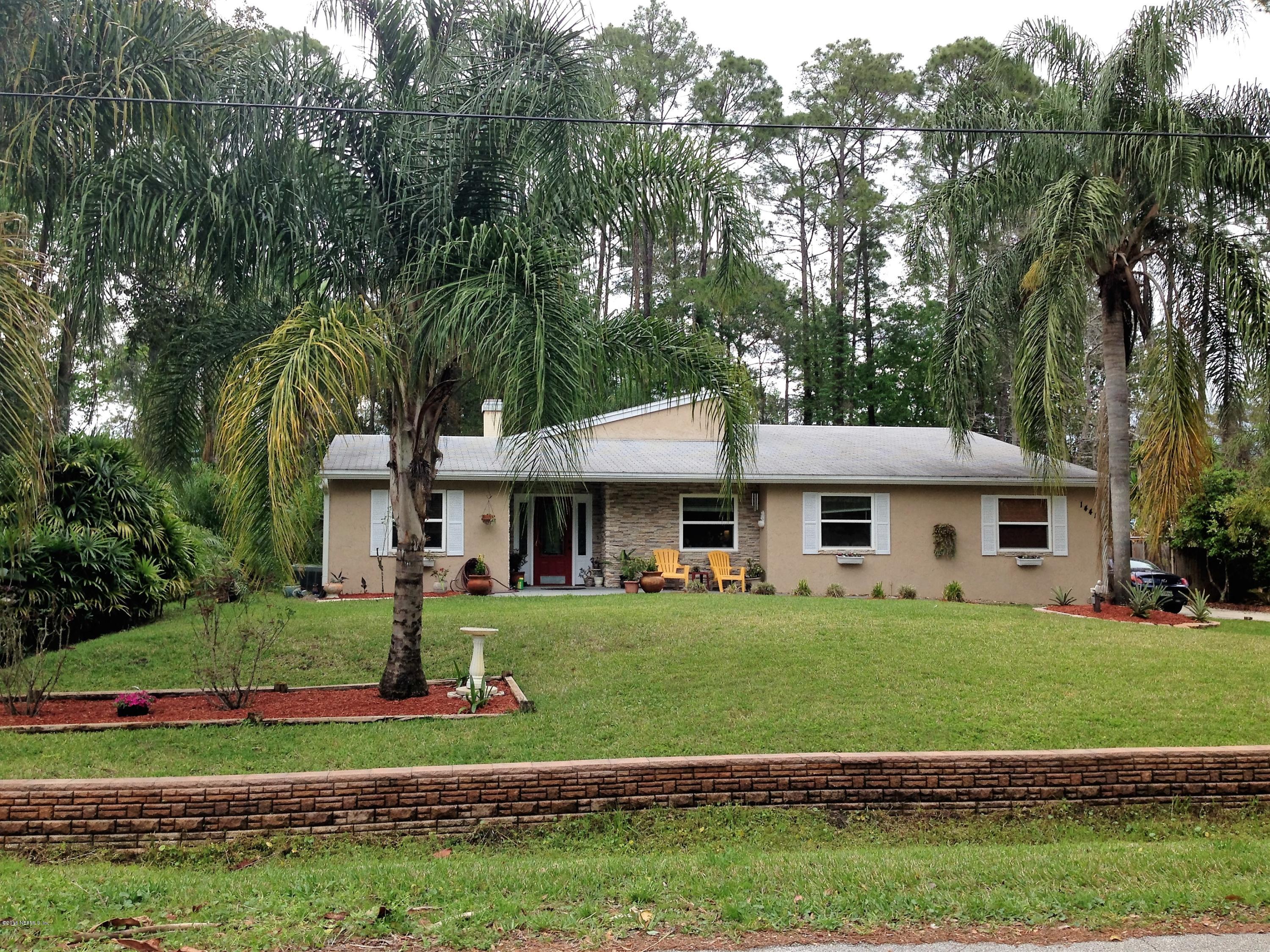 1441 Satsuma Road St. Johns, FL 32259 - Photo 2 of 45 a front view of a house with a yard