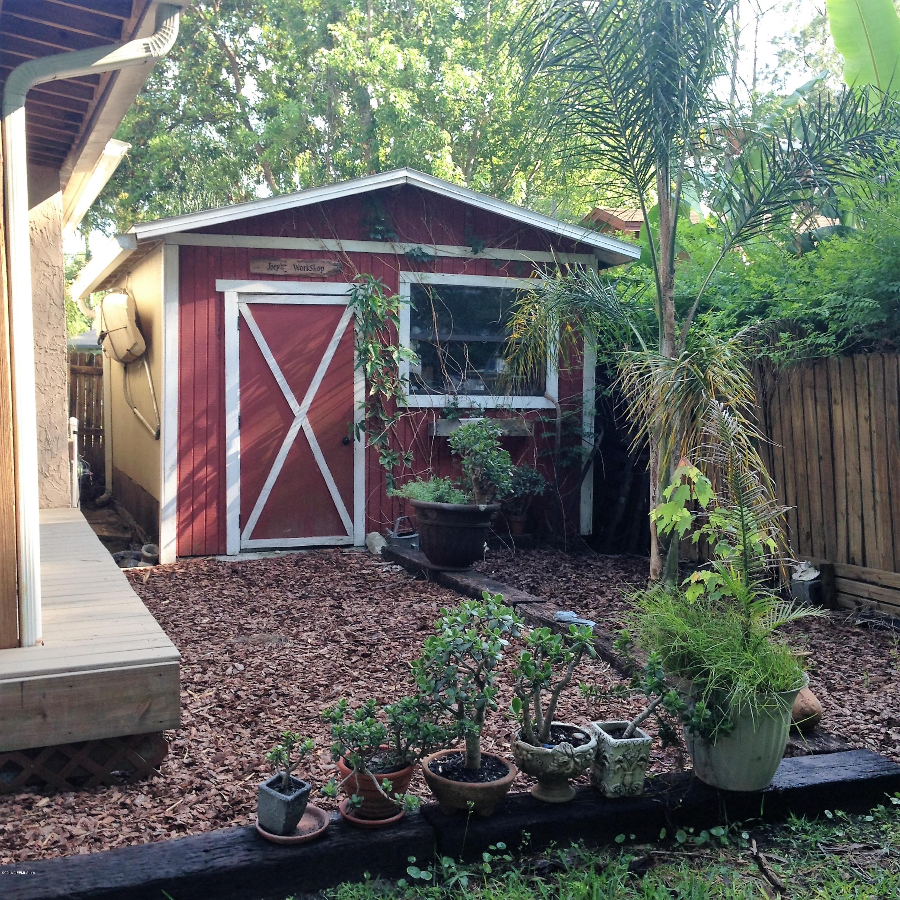 1441 Satsuma Road St. Johns, FL 32259 - Photo 40 of 45 a front view of a house with garden