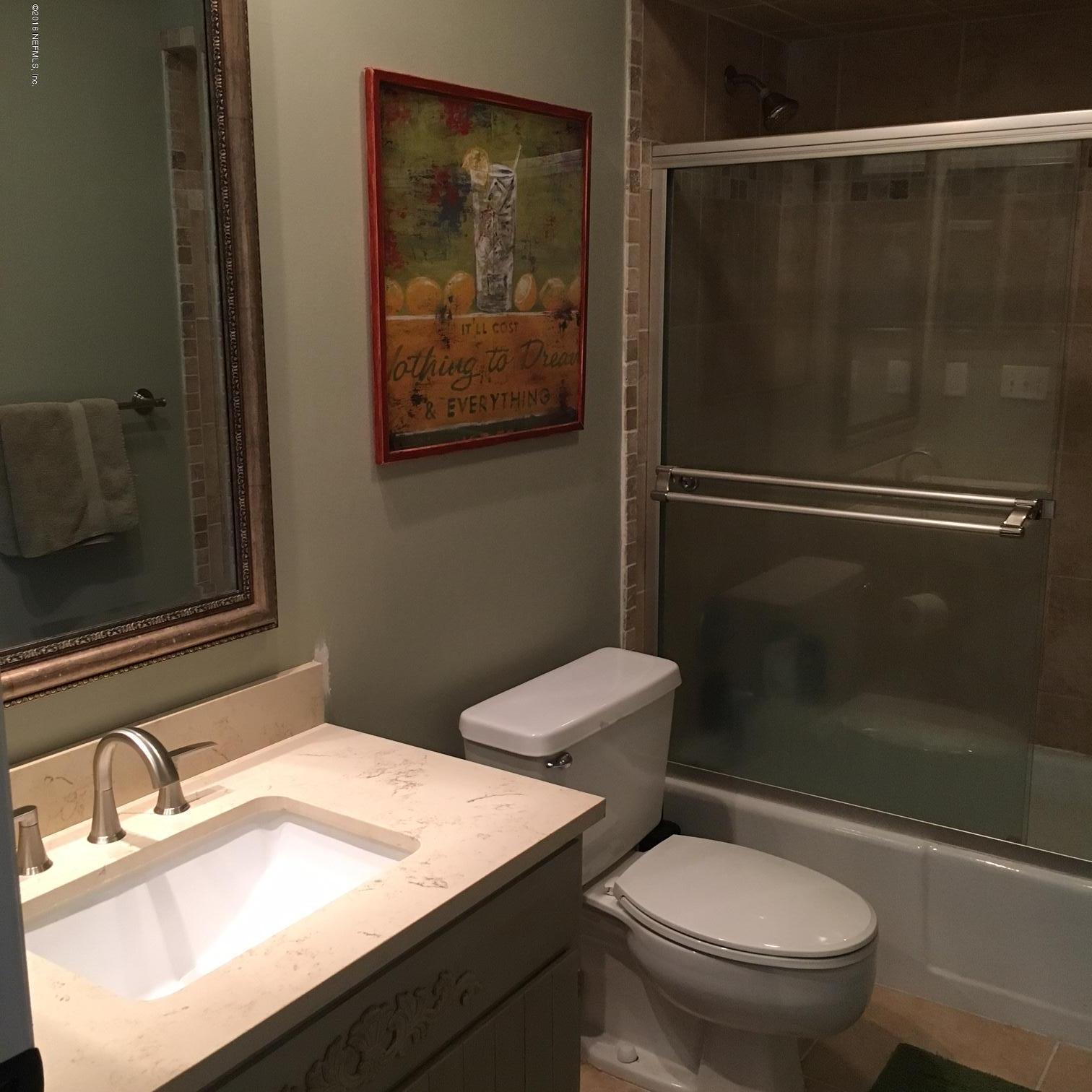 1441 Satsuma Road St. Johns, FL 32259 - Photo 10 of 45 a bathroom with a toilet sink and shower