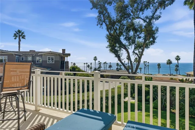 a view of balcony with furniture and outdoor seating