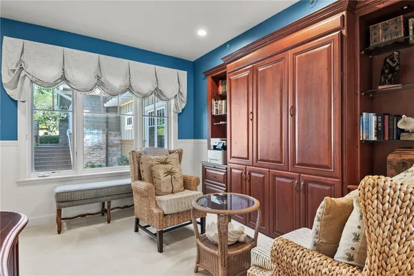 a spacious bathroom with a granite countertop sink a toilet and shower