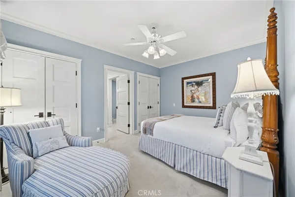 a bedroom with a bed and a fireplace