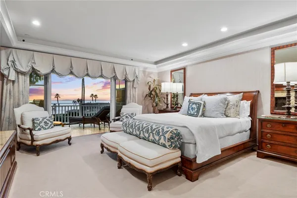 a bathroom with a granite countertop sink a large mirror a vanity and