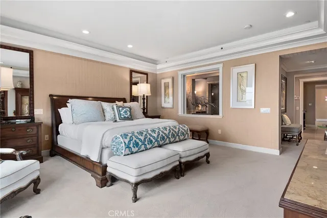 a bathroom with a shower a mirror and a sink