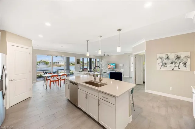 a view of kitchen center island and living room