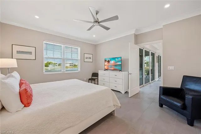 a bedroom with bed and a window