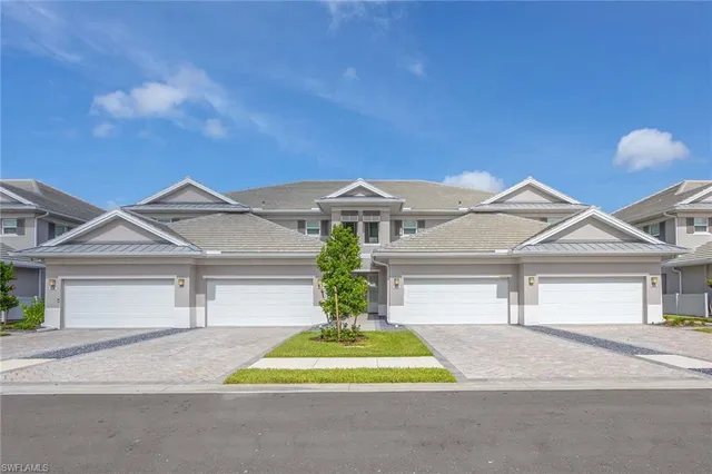 front view of a house and a yard