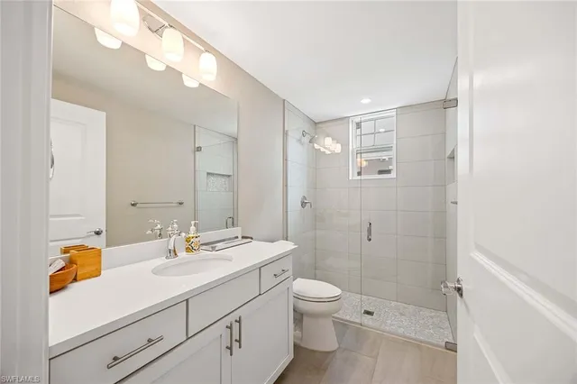 a view of storage and utility room with washer and dryer